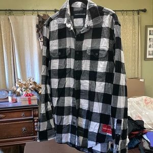 Men’s Calvin Klein flannel shirt. Black and white plaid. Size medium